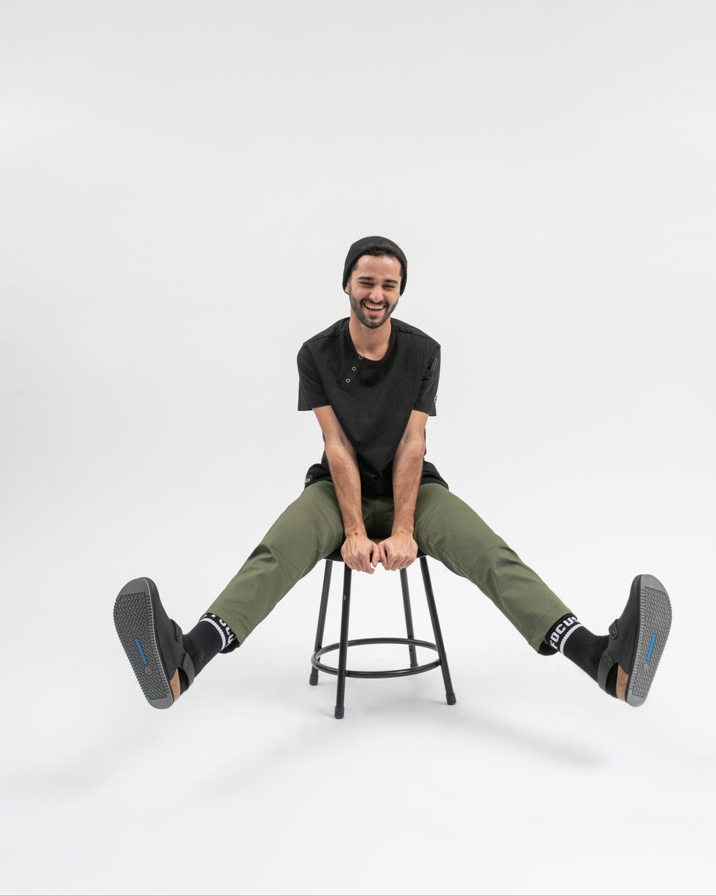 TILIT model in Essential Pants in Olive Green and Henley Tee in Black